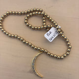 PR gold moon necklace
