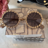 LS gold round glasses