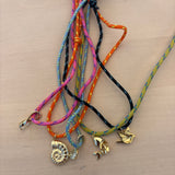 PR charm top necklace